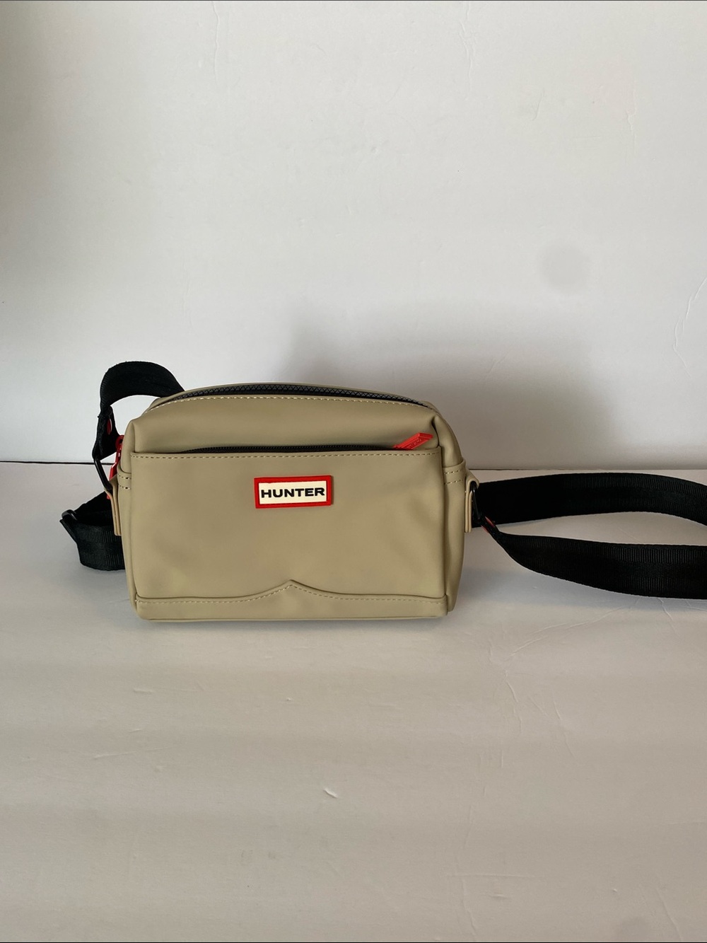 Hunter Beige Crossbody Bag with Black Strap and Red Trim - Water Resistant
